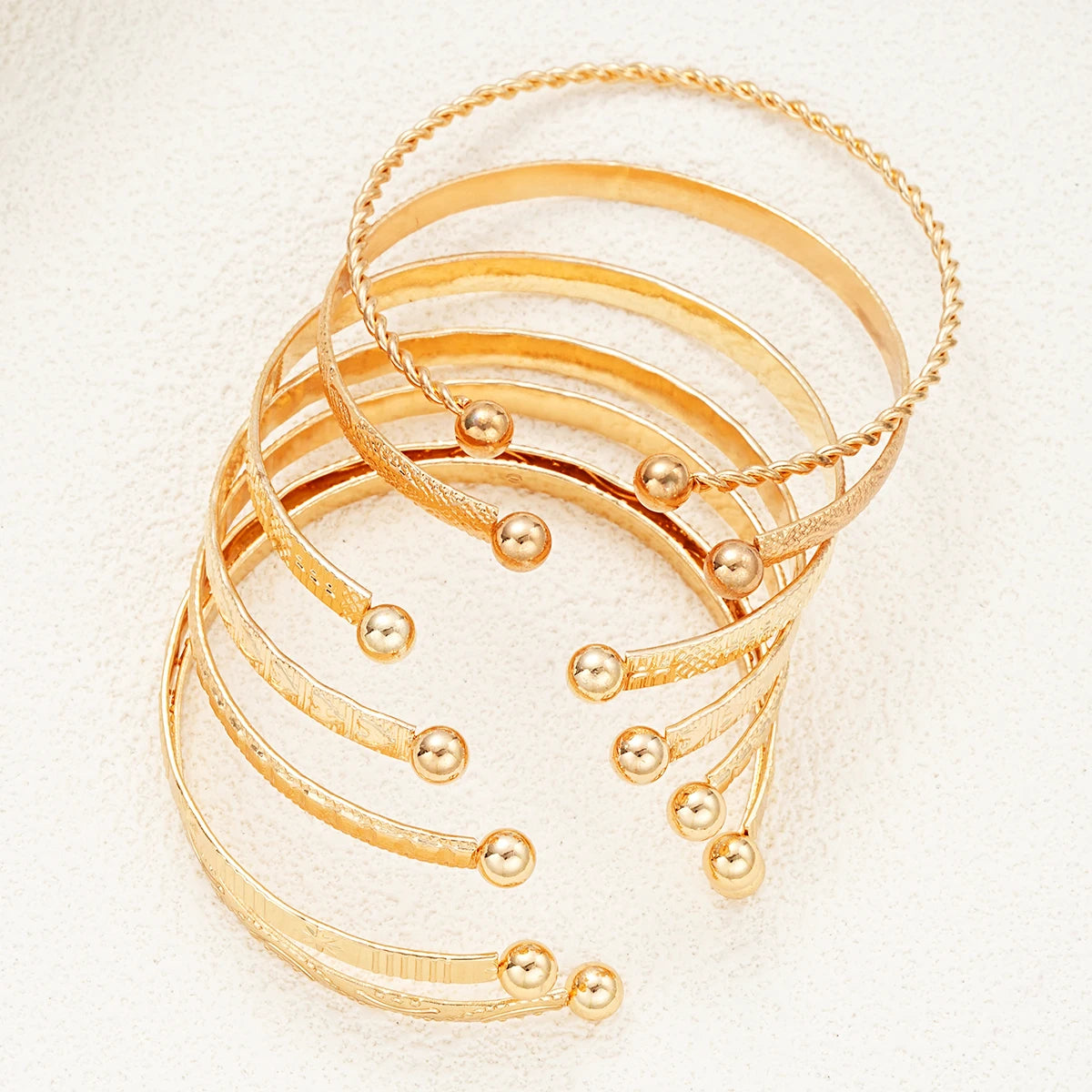 Punk-Chic Set: 7-teiliges Herz-Armband-Set in Gold
